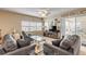 Living room features a comfy seating area and large window at 5300 S Atlantic Ave # 15-601, New Smyrna Beach, FL 32169