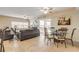Casual dining area with glass-top table and balcony access at 5300 S Atlantic Ave # 15-601, New Smyrna Beach, FL 32169