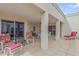 Relaxing balcony featuring comfortable chairs and a small table at 5300 S Atlantic Ave # 15-601, New Smyrna Beach, FL 32169