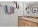 Clean bathroom with granite vanity and updated fixtures at 5300 S Atlantic Ave # 15-601, New Smyrna Beach, FL 32169