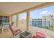 Relaxing balcony with seating and views of the surrounding area at 5300 S Atlantic Ave # 15-601, New Smyrna Beach, FL 32169