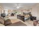 Spacious main bedroom with king bed and adjoining office area at 5300 S Atlantic Ave # 15-601, New Smyrna Beach, FL 32169