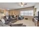 Living area with comfy seating and view of balcony at 5300 S Atlantic Ave # 15-601, New Smyrna Beach, FL 32169