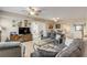 Spacious living room with comfortable sofas and access to balcony at 5300 S Atlantic Ave # 15-601, New Smyrna Beach, FL 32169