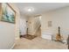 Entryway with tiled floor and staircase to upper level at 5300 S Atlantic Ave # 15-601, New Smyrna Beach, FL 32169