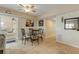 Bright dining area with glass table and four chairs at 5300 S Atlantic Ave # 15-601, New Smyrna Beach, FL 32169