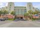 Building exterior featuring parking and landscaping at 5300 S Atlantic Ave # 15-601, New Smyrna Beach, FL 32169