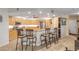 Kitchen boasts granite counters and breakfast bar at 5300 S Atlantic Ave # 15-601, New Smyrna Beach, FL 32169