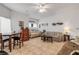 Living area with a sofa, daybed, and dining table at 5300 S Atlantic Ave # 15-601, New Smyrna Beach, FL 32169