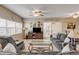 Spacious living room with comfy sofas, TV, and access to balcony at 5300 S Atlantic Ave # 15-601, New Smyrna Beach, FL 32169