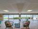Common area with wicker furniture and patio doors leading outside at 3606 S Peninsula Dr # 614, Port Orange, FL 32127