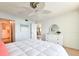 Bedroom with water views, white dresser, and coastal decor at 3606 S Peninsula Dr # 614, Port Orange, FL 32127