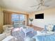 Living area with water views and access to balcony at 3606 S Peninsula Dr # 614, Port Orange, FL 32127