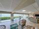 Common area with water views and comfortable seating at 3606 S Peninsula Dr # 614, Port Orange, FL 32127