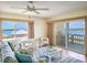 Spacious living room with water views and comfortable seating area at 3606 S Peninsula Dr # 614, Port Orange, FL 32127