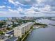 Aerial view of a waterfront condo building with a pool at 3606 S Peninsula Dr # 614, Port Orange, FL 32127