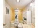 Clean bathroom with tub, shower, and vanity at 3606 S Peninsula Dr # 614, Port Orange, FL 32127