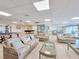 Relaxing common area with wicker furniture and water views at 3606 S Peninsula Dr # 614, Port Orange, FL 32127