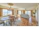 Elegant dining area with chandelier and view overlooking the water at 3606 S Peninsula Dr # 614, Port Orange, FL 32127