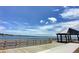 Relaxing pier with gazebo overlooking the water at 113 Neptune Dr, Edgewater, FL 32132