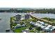 Aerial view of waterfront property showing two condo buildings and surrounding area at 501 N Causeway # 2050, New Smyrna Beach, FL 32169
