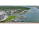 Aerial view of waterfront community with houses, boats, and marina at 501 N Causeway # 2050, New Smyrna Beach, FL 32169
