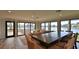 Spacious common area with large table, sofa, and waterfront views at 501 N Causeway # 2050, New Smyrna Beach, FL 32169