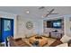 Relaxing living room with large TV, comfortable seating, and stylish decor at 501 N Causeway # 2050, New Smyrna Beach, FL 32169