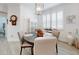 Elegant dining room with a round table and plenty of natural light at 456 Lime Ave, Daytona Beach, FL 32124