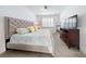 Bright bedroom featuring a king-size bed and modern decor at 456 Lime Ave, Daytona Beach, FL 32124