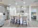 Modern kitchen with gray cabinets, white quartz countertops and island at 456 Lime Ave, Daytona Beach, FL 32124