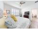 King-size bed, TV, and ensuite bathroom access at 456 Lime Ave, Daytona Beach, FL 32124
