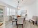 Bright dining room featuring a round table and four chairs at 456 Lime Ave, Daytona Beach, FL 32124