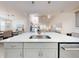 Open concept kitchen island with sink and dishwasher at 456 Lime Ave, Daytona Beach, FL 32124