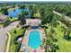 Community pool with surrounding lounge area at 679 Mount Olympus Blvd, New Smyrna Beach, FL 32168