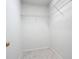 Walk-in closet with wire shelving at 679 Mount Olympus Blvd, New Smyrna Beach, FL 32168