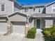 Two-story townhome with attached garage at 679 Mount Olympus Blvd, New Smyrna Beach, FL 32168