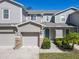 Two-story townhome with attached garage at 679 Mount Olympus Blvd, New Smyrna Beach, FL 32168