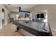 Game room with pool table and view into kitchen at 510 Sun Lake Dr, Port Orange, FL 32127