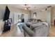 Living room with sectional sofa and sliding glass doors at 510 Sun Lake Dr, Port Orange, FL 32127