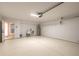 Garage with utility sink and extra storage at 2266 Hawks Cove Cir, New Smyrna Beach, FL 32168