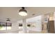 Open concept living area with high ceilings and a view of the kitchen at 2266 Hawks Cove Cir, New Smyrna Beach, FL 32168