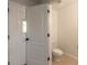 Convenient half-bath with toilet and single door entry at 2266 Hawks Cove Cir, New Smyrna Beach, FL 32168