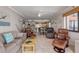 Open living room with ocean view and comfortable seating at 4141 S Atlantic Ave # 502, New Smyrna Beach, FL 32169