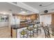 Kitchen with granite countertops and wood cabinets at 4141 S Atlantic Ave # 502, New Smyrna Beach, FL 32169