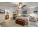 Spacious bedroom with king-size bed and ensuite bathroom access at 4141 S Atlantic Ave # 502, New Smyrna Beach, FL 32169