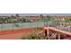 Elevated tennis court with ocean views and lounge area at 4141 S Atlantic Ave # 502, New Smyrna Beach, FL 32169
