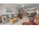Living room with comfortable seating and an ocean view at 4141 S Atlantic Ave # 502, New Smyrna Beach, FL 32169