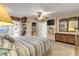 King-size bed in bedroom with ocean view and access to balcony at 4141 S Atlantic Ave # 502, New Smyrna Beach, FL 32169