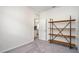 Spacious bedroom with a view of the kitchen at 2352 Litchfield Loop, Deland, FL 32720